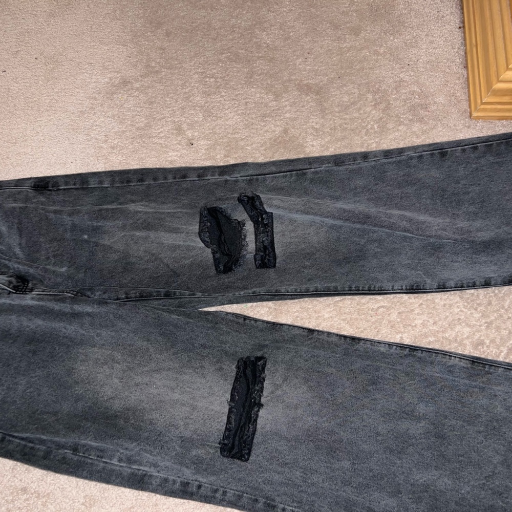 black flare ripped jeans